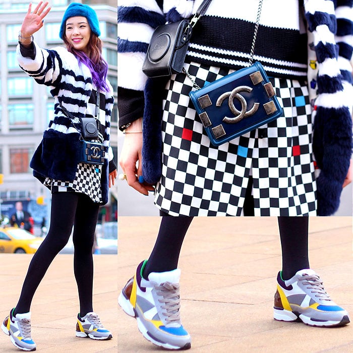 Model wearing a checked skirt with colorful sneakers