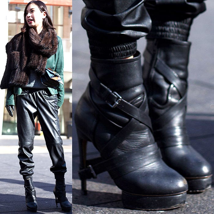 Model wears boots with buckled harness straps