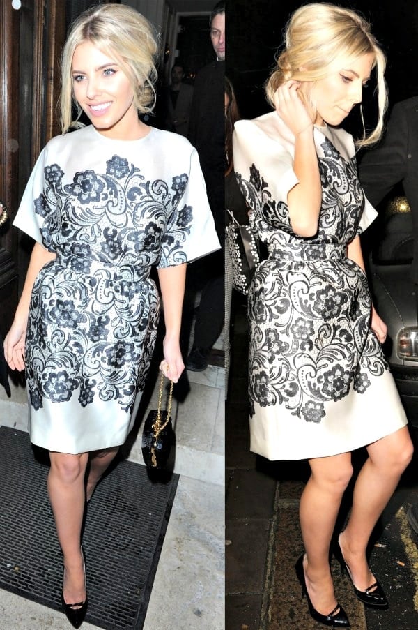 Mollie King in a white Dolce & Gabbana satin dress with black lace print and black Gucci pumps