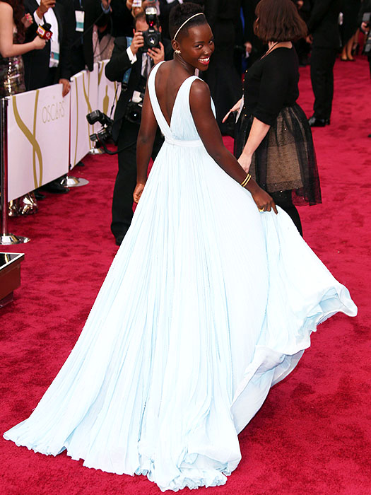 Lupita was clearly having fun with her Prada gown on the red carpet.