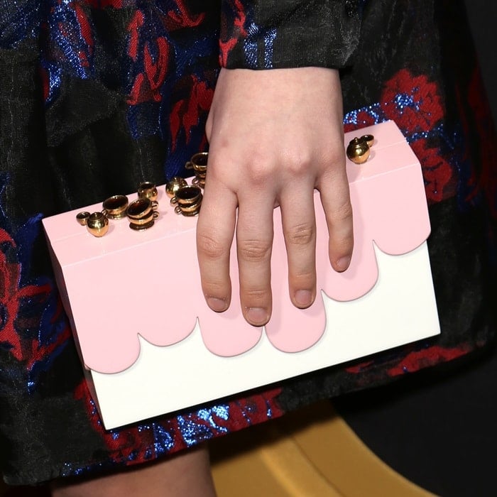 Malina Weissman's quirky white and pink box clutch