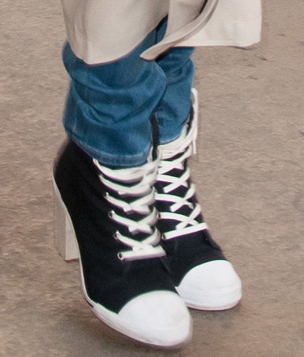 Rita Ora wearing DKNY for Opening Ceremony high-heel sneakers