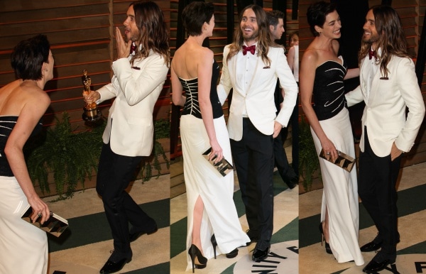 Jared Leto photobombing and sharing a laugh with Anne Hathaway at the 2014 Vanity Fair Oscar Party held at Sunset Plaza in West Hollywood, California, on March 2, 2014