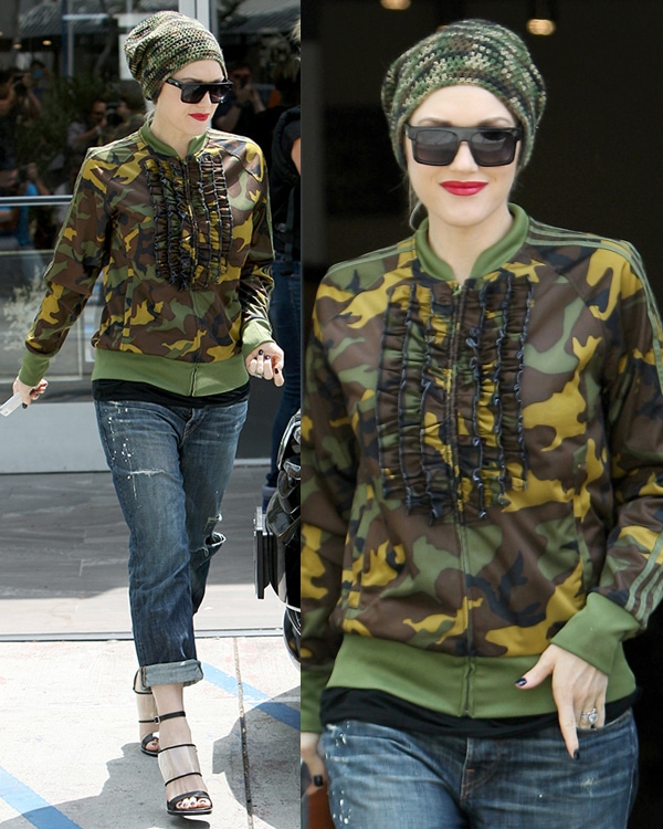 Gwen Stefani sporting an adidas Jeremy Scott ruffle camo jacket over a black top teamed with a pair of loose-fitting torn jeans