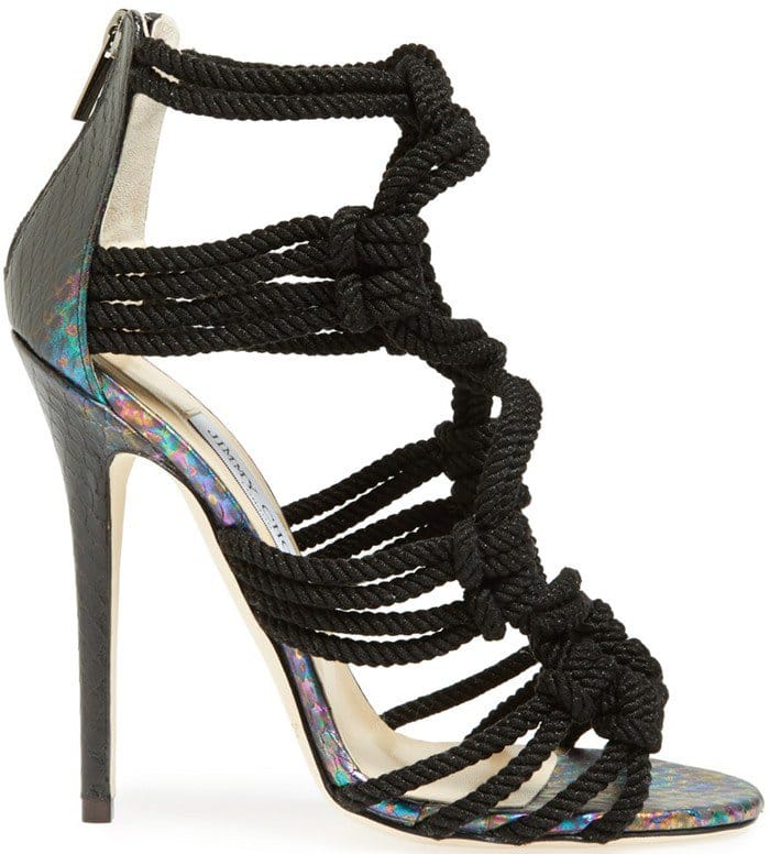 An iridescent finish illuminates the snake-stamped leather of a head-turning sandal with intricately knotted straps