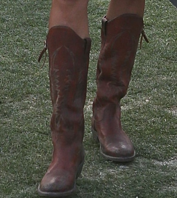 Alessandra Ambrosio's dark brown cowboy boots