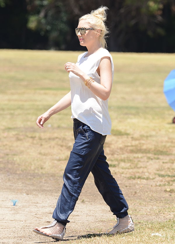 Gwen Stefani wore a simple white tee and a pair of blue cargo pants