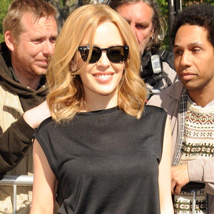 Kylie Minogue capped off the combination with dark sunnies and barely there jewelry
