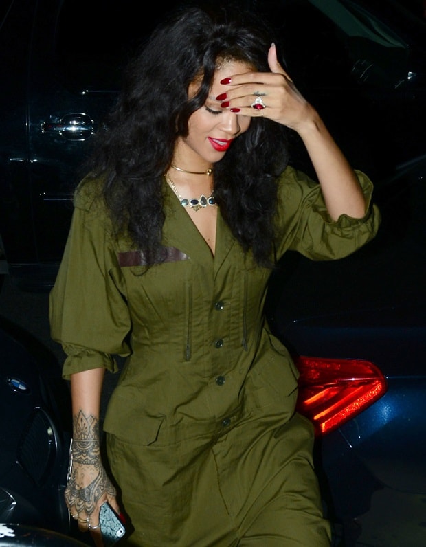 Rihanna in a green jumpsuit by Japanese fashion designer Yohji Yamamoto