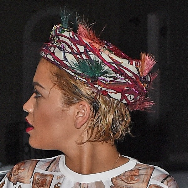 Rita Ora donned a feathered headscarf, which very much resembled a bird's nest