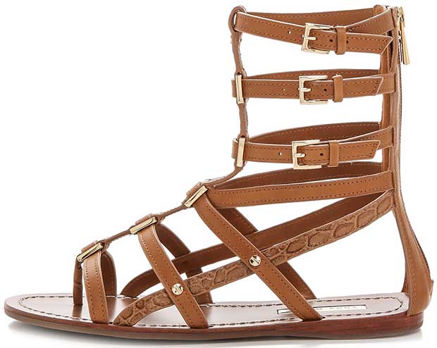Smooth and croc-embossed leather lends elegant texture to effortless cowhide gladiator sandals