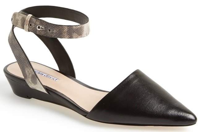 A stunning pointy-toe flat with a snakeskin-embossed wraparound ankle strap is both casual and chic, making it a natural choice for both work and play