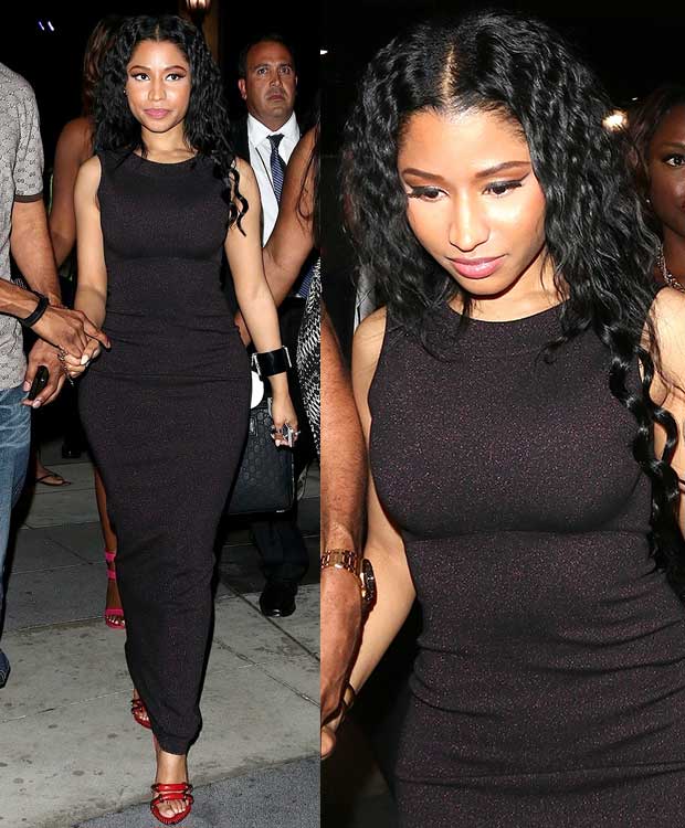 Nicki Minaj left the venue in a glittery but simple black dress styled with a pair of red heels by Anthony Vaccarello