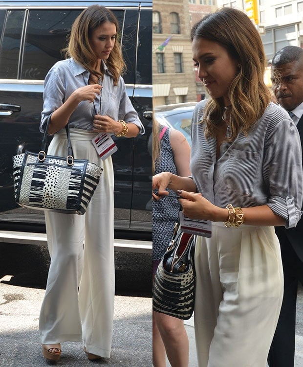 Jessica Alba styled the outfit with a few golden cuffs by Jennifer Fisher, carried the same Christian Louboutin tote, and completed the ensemble with a pair of platform wedges