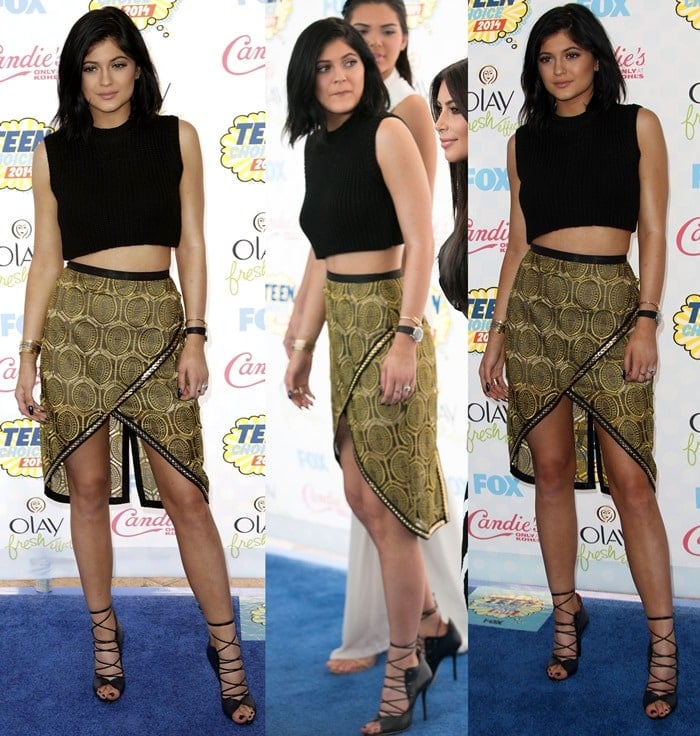Kylie Jenner sported a gold-and-black printed skirt from the Sass & Bide Fall 2014 collection paired with a cropped black top