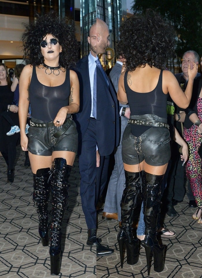 Lady Gaga in hand-stitched tire shorts featuring lace-up details and cutouts at both front and back