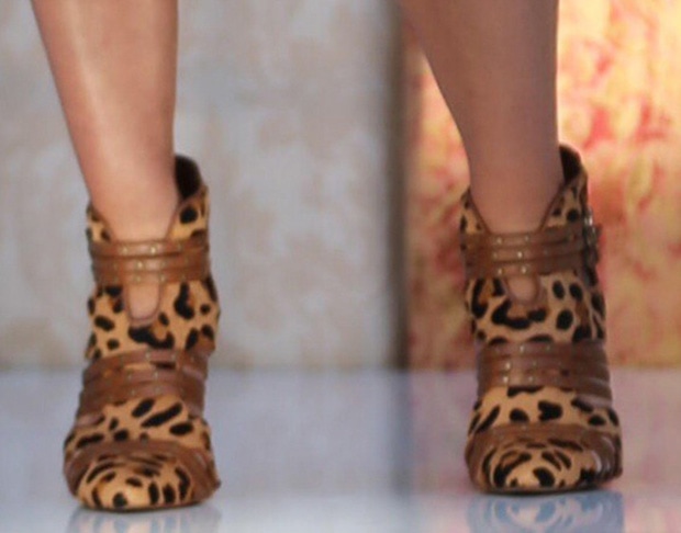 Jessica Simpson wearing leopard print pump booties