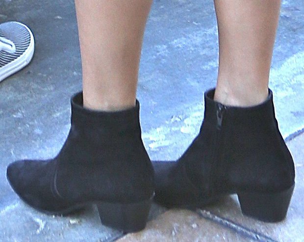 Kourtney Kardashian wearing suede ankle boots