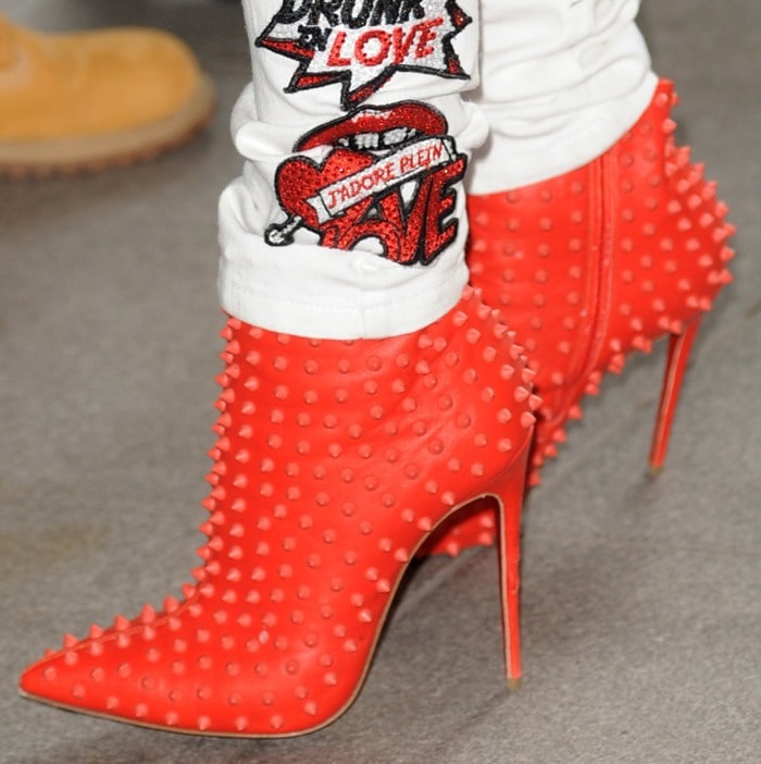 Rita Ora in red studded Christian Louboutin Snakilta booties