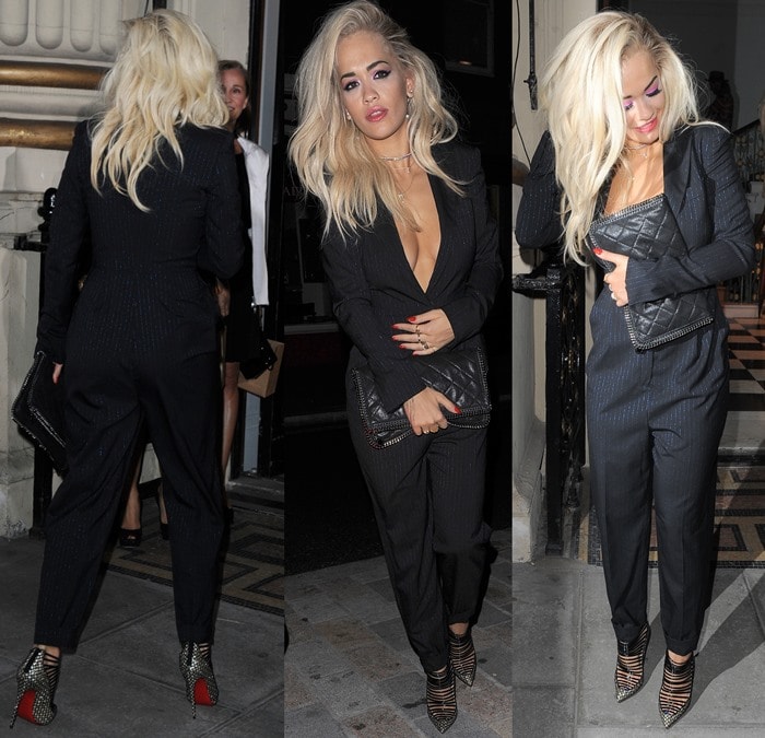 Rita Ora showed some serious cleavage in a plunging black jumpsuit by Stella McCartney