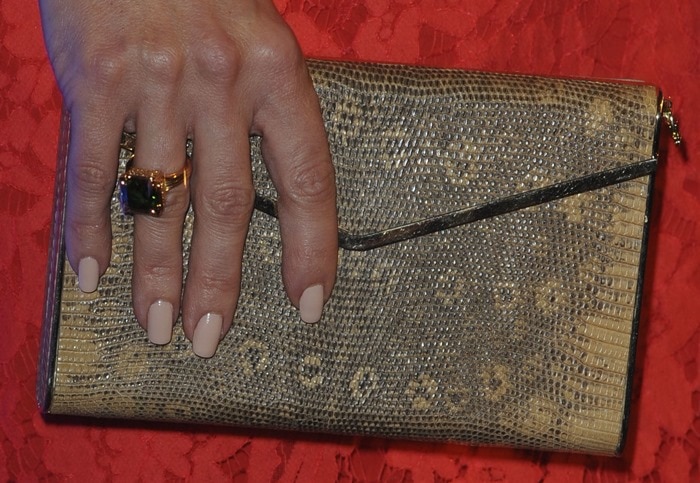 Kate Hudson toting a snake-print Brian Atwood clutch