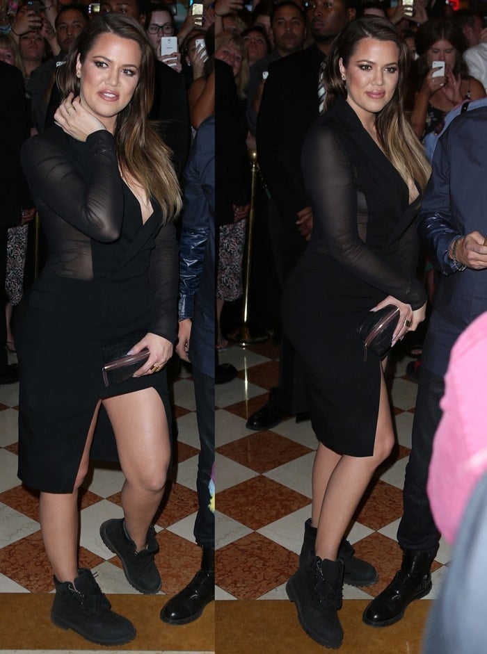 Khloe Kardashian in a black tuxedo dress paired with Timberland work boots and a Jennifer Zeuner star necklace