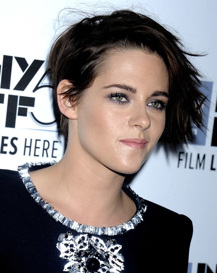 Kristen Stewart's edgy dress features monochromatic floral embroideries and aluminum details on the neckline