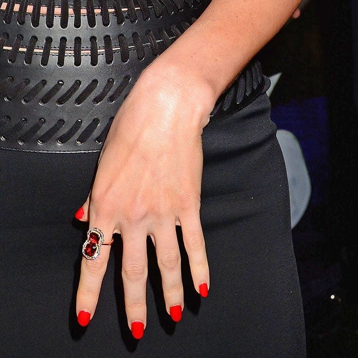 Megan Fox's ruby ring and bright Rouge Louboutin red nails