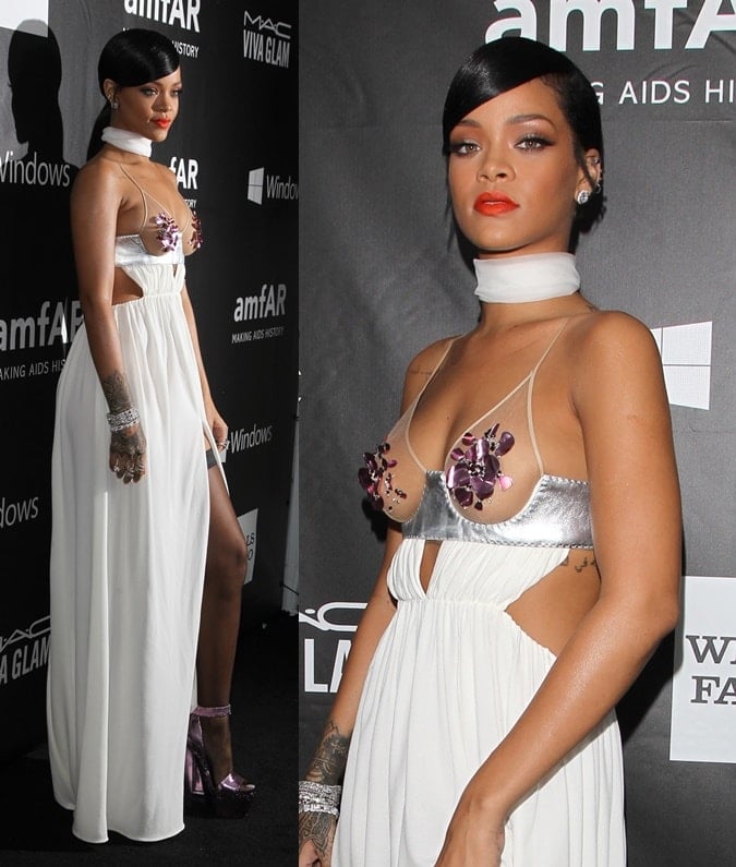 Rihanna wore the Tom Ford creation with a pile of diamond jewelry, black thigh-high hosiery, and metallic platform sandals in the same lavender shade as the floral decoration on her dress.