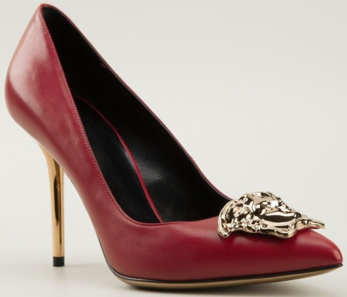 Red calf leather Idol pumps from Versace featuring pointed toes, a gold-tone Medusa head plaque on each vamp, and gold-tone stiletto heels