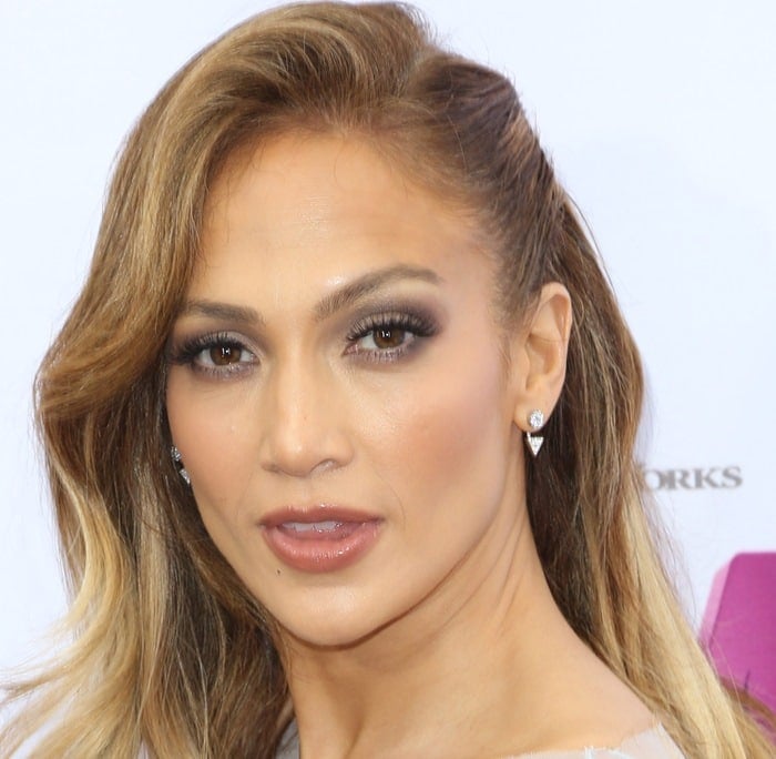 Jennifer Lopez attended the premiere of her new film 'Home' held at the Regency Village Theatre