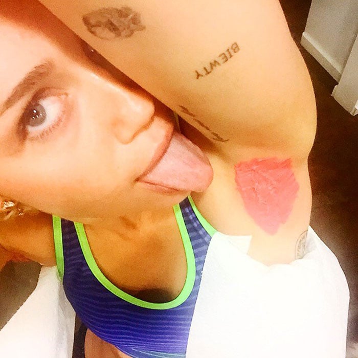 Miley Cyrus showing off her newly dyed armpit and pubic hair on Instagram on May 1, 2015