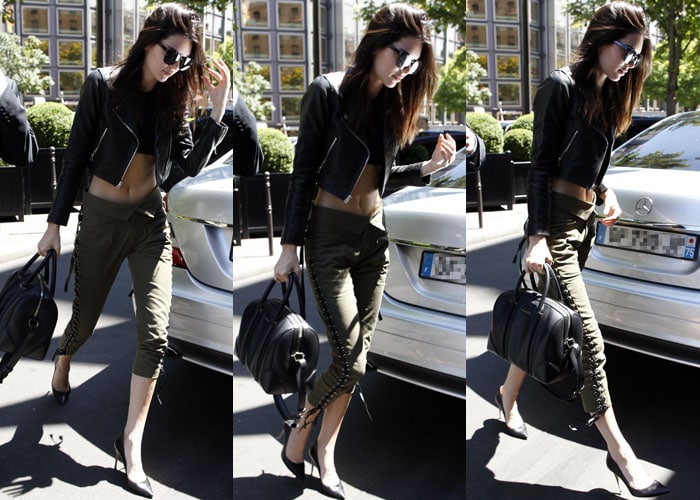 Kendall Jenner wore a leather jacket from Laer, Ronny Kobo pants, Dior sunglasses, and a pair of Gianvito Rossi Ellipsis pumps