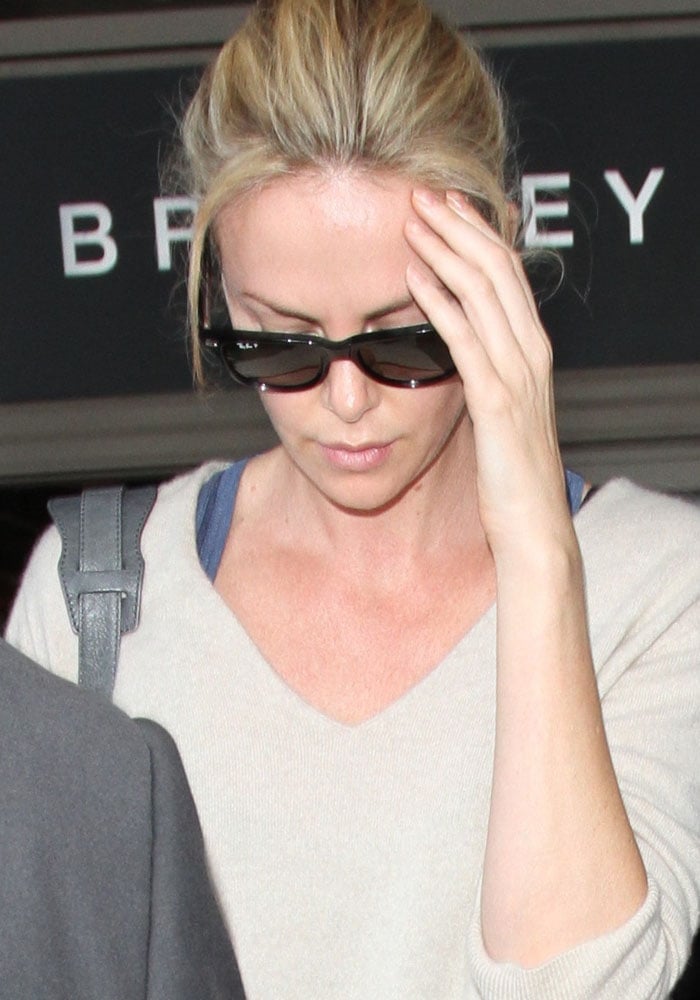 Charlize Theron wore a loose knit cardigan