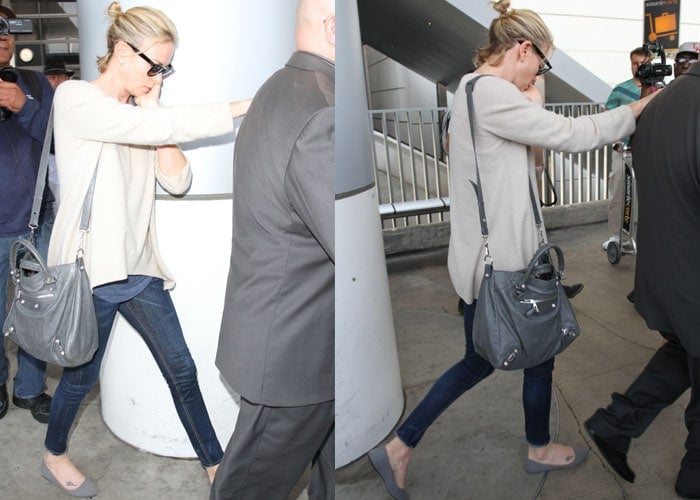 Charlize Theron arrives at Los Angeles International Airport (LAX) on July 31, 2015