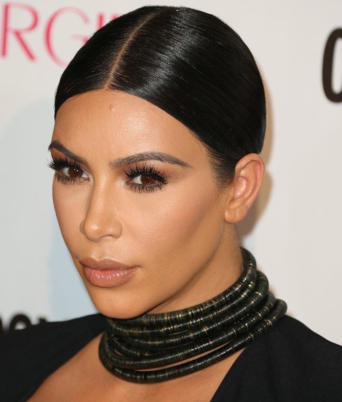 Kim Kardashian flaunted her assets in a versatile Wolford tube dress