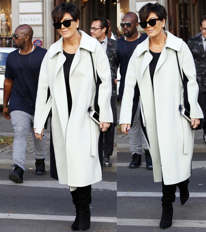 Kris Jenner sported an oversized woolen winter coat featuring a large collar and two vertical black stripes on either side