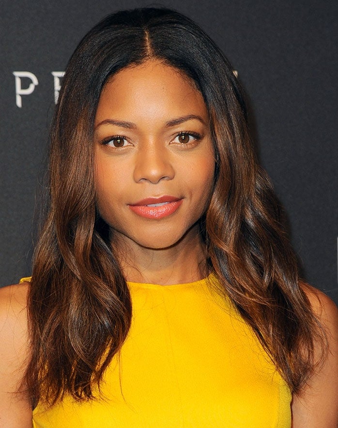 Naomie Harris brightened up the black carpet in her demure pleated frock