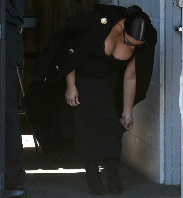 Kim Kardashian in a versatile Wolford tube dress styled with a black cotton ribbed Faith Connexion tank top