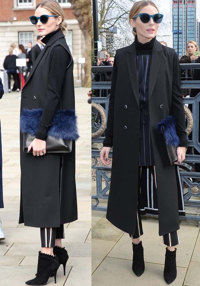 Olivia showed off her amazing styling skills yet again by pairing a striped navy tunic with striped trousers underneath a black sleeveless coat — all from Topshop