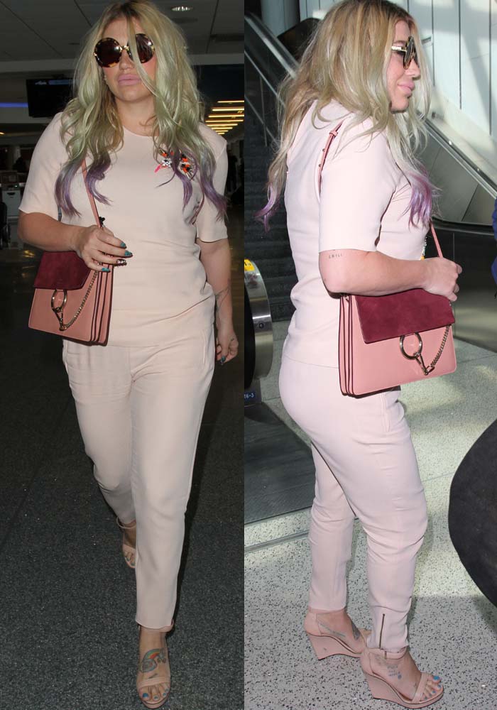 Kesha's pink top with a floral embroidery detail on the left shoulder