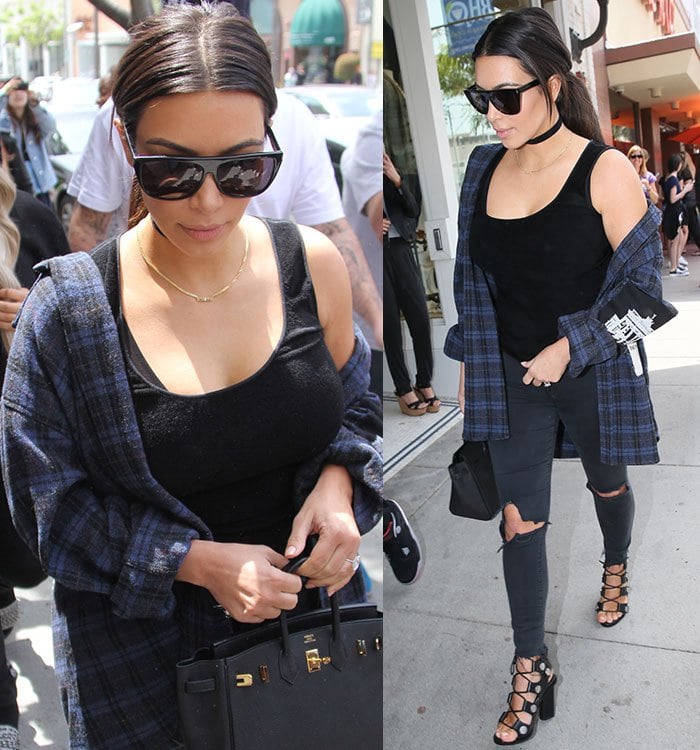 Kim Kardashian amped up the casual look by accessorizing with a black choker