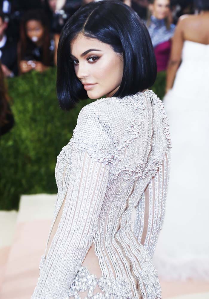 Kylie Jenner displays the intricately made Balmain dress from family friend and head designer Olivier Rousteing