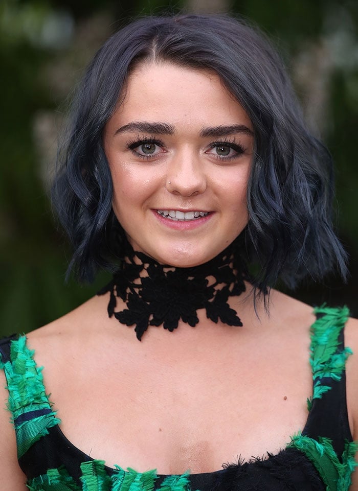 Maisie Williams debuting a newly dyed black bob with hints of electric blue shade