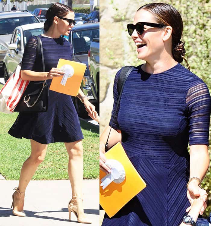 Jennifer Garner pulled her hair back into a low bun and wore minimal makeup, with her eyes hidden behind black sunnies