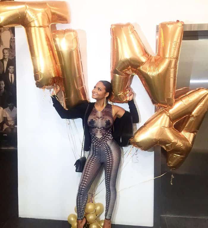Christina poses with her birthday balloons