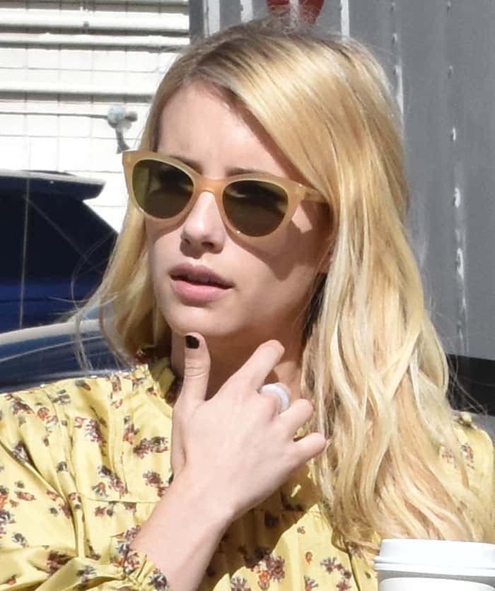 Emma Roberts chose to wear her hair down in natural waves and sport minimal makeup for the casual outing