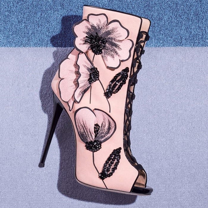 Pink suede ‘June’ boots featuring a flower motif with black crystals and paillettes