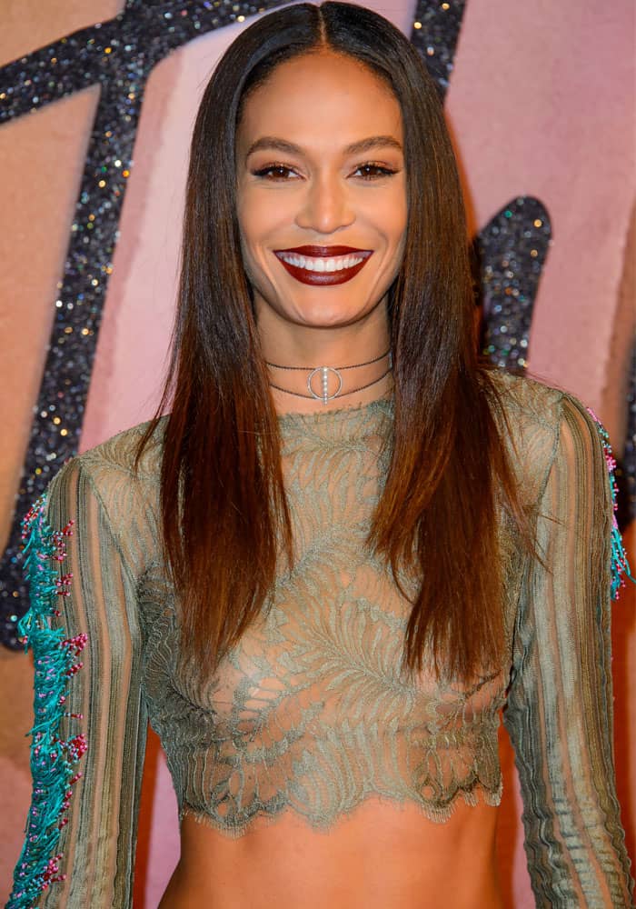 Joan Smalls arrived at the fashion year-ender's red carpet looking stunning in a cropped see-through ensemble
