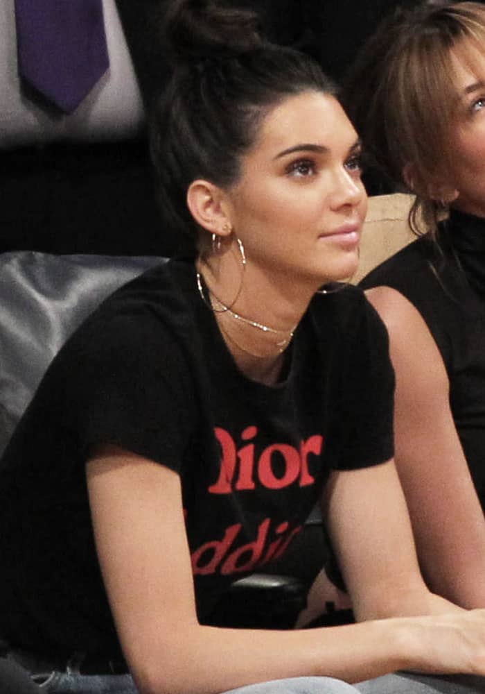 Kendall Jenner expressed her love for Dior by wearing a "Dior Addict" statement shirt